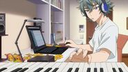 Sosuke playing a few keys on the piano