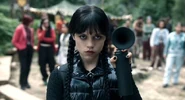 Wednesday Addams with an airhorn