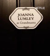 Joanna Lumley's name on a door announcing her role as Grandmama