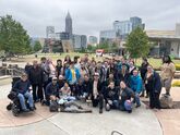 Group picture in front of Georgia Aquarium.