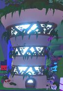 The exterior of the Eco Natural Earth House at night.