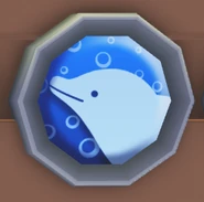 The Dolphin Badge on the wooden board.