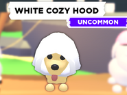 The White Cozy Hood as seen on a Dog.