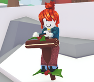 A player riding the Yule Log Pogo Stick.