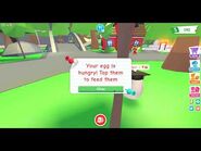 The pop up alerting the player that they must feed the egg.