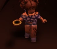 A player holding the Ash Zebra Bait.