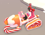 A player riding the Candy Snowmobile.