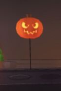 The Halloween Orange Pumpkin Balloon on display in the Halloween Shop.