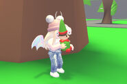 A player interacting with the Elf Plush