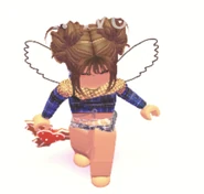 Player holding the Gingerbread Holly Flying Disc..png (159 KB) A player holding the Gingerbread Holly Flying Disc.