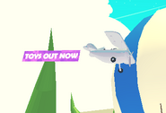 The stylised Racing Monoplane in flight.