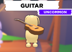 AM guitar pet accessory.png