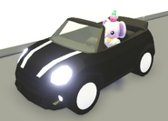 A player driving the Tiny Convertible.