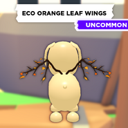 Eco Orange Leaf Wings on a Dog