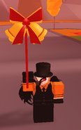 A player holding the Festive Bells Balloon.