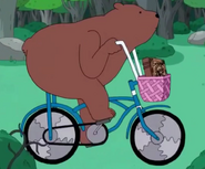 S4e7 bear riding a bicycle