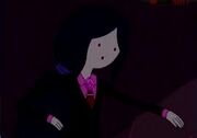 Marceline wearing a suit.