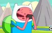 Finn, the person with the... Is he kissing a rock!?