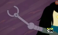 Shoko's robotic arm as shown in "Come Along With Me"