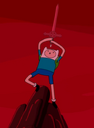 Finn with sword on cliff