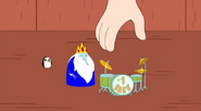 Little Gunter and Ice King with a little drumset.