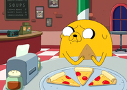 S7e19 Jake eating Pizza