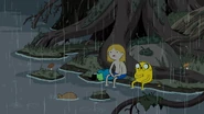 S4e23 Finn and Jake sitting in the rain
