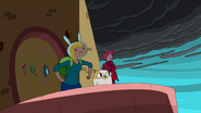 Fionna, Cake, and Prince Gumball look on the coming storm.