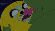 S4e23 Mega Frog slobbering on Jake's face