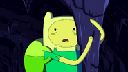 S4e23 Finn clinging to stalactite