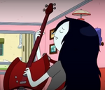 Marceline playing somber beats with her Ax Bass in "I Remember You"