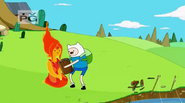 Finn giving Fire Princess a log