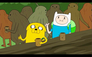 Finn and Jake have a drink.