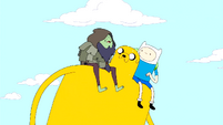 S3e3 Jake carrying Finn and Rag Wizard