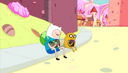S4e8 Finn and Jake sitting on curb