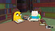 S2e15 finn and jake reading in library