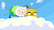 Finn & Jake looking down at The Land of OOO