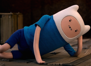 S7e22 Finn laying down