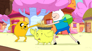 S5e3 Finn and Jake sticking thumbs in apple pie