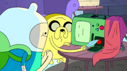 S2e16 Jake tickling BMO with feather