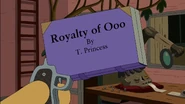 Shermy holding a holobook, visualizing Mount Cragdor, BMO's home in the future