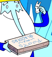 Ice King holding one of the game pieces