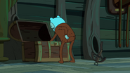 S7e31 Finn tosses crossbow as he digs through weapons chest