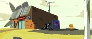 BMO and Marceline watch Jake skateboarding outside the store.