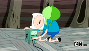 Finn hugging Beemo without knowing why