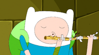 S5e51 Finn playing flute