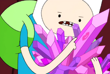 S2e8 finn pointing to lipstick on crystal