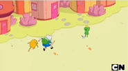 Finn and Jake skipping and making silly faces