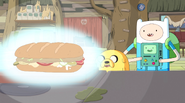 S5e33 Finn, Jake, and BMO admiring sandwich