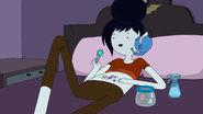 Marceline pulling insects out of her belly button.